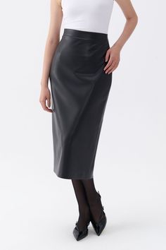 Add an instant edge to any outfit with this midi skirt crafted from faux leather, featuring a back slit for added flair. It features a high waist, slim fit, robust hidden zipper, no pockets, complete lining, and a midi cut. Main Material: 73% Polyester, 24% Polyurethane 3% Elastane Lining: 100% Polyester Trim: No Trim Washing & Care Instructions: Can be wiped with a damp cloth, bleaching is not recommended, tumble drying is not recommended, ironing is not recommended, dry cleaning is not recommended Cloth Bleaching, Brand Magazine, Black Leather Skirts, Black High Waist, Blazer With Jeans, Faux Leather Skirt, Independent Designers Fashion, S Models, Badger