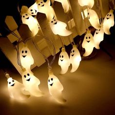 a group of ghost lights hanging from the ceiling