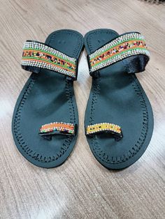 This African beaded Masai sandals are made from leather and beads which comes in different colours of ones choice. It can be customised in terms of size,pattern and colour. They can be warn at any given time, whether in weddings, parties, holidays at the beach and home. Note:This listing is for one pair,  but I do both wholesale and retail Leather And Beads, African Beads, Size Pattern, Strappy Sandals, Gladiator Sandals, Kenya, At The Beach, Women's Shoes Sandals, Shoes Sandals