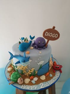 a birthday cake with an ocean theme on it