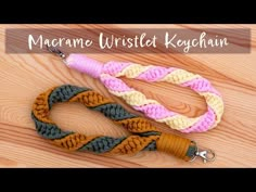 two different colored leashs on top of a wooden floor with the words, macrame wristlet keychain