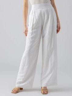 DETAILS Pleated Wide Leg Trousers with Elastic Back Waistband 2 Front and 2 Back Pockets Pull-On  Relaxed Fit SIZE + FIT Model is 5'8" and is wearing a size 27. Waist: 29 1/2" Front Rise: 13 1/4" Inseam: 32" Leg Opening: 24" FABRIC + CARE Shell: 54% Linen 46% Viscose Lining: 100% Cotton Polished Linen Machine Wash Cold, Hang to Dry Imported MADE WITH SUSTAINABILITY IN MIND Flax is the second most highly productive crop (after hemp). Flax can successfully grow without the use of herbicides and pesticides. The production uses little water which makes it the second most water efficient. Denim Jogger Pants, Athleisure Tops, Linen Blend Pants, Denim Outerwear, High Rise Pants, Skirt Leggings, Dress Pant, Cotton Pants, Wide Leg Trousers