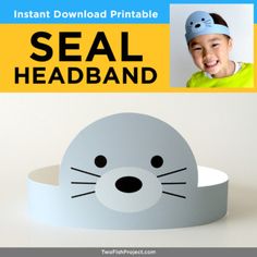 the seal headband is designed to look like it's wearing a paper hat