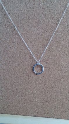 The hoop silver pendant. Simple hoop sterling silver pendant.Genuine sterling silver finished in hammered effect The silver pendant is 15 mm in size,hang in 18 inches sterling silver chain. 16 inches available as well. This is a lovely and unique pendant. The pendant will come in a lovely gift boxed. Matching earrings available. https://www.etsy.com/listing/222252893/loop-post-earrings-hammered-loop-stud?ref=shop_home_active_1 Fish Jewelry Silver, Hoop Jewelry, Hoop Necklace, Silver Necklace Simple, Foxes Necklace, Gold Circle Necklace, Silver Flower Necklace, Nature Necklace, Round Necklace