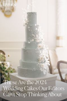 a wedding cake with white flowers on it and the words, these are the 2012 wedding cakes our editor can't stop thinking about