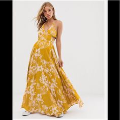 Lovely Flowy Maxi Dress With Adjustable Strappy Back And Neck Tie Details, Yellow With White Floral Print. Only Worn Once. Size Small Ruffled Feathers, Long Dresses Casual Maxi, Casual Maxi Dress, Mid Length Shorts, Flowy Maxi Dress, Golden Goose Deluxe Brand, Short Dresses Casual, Free People Dresses, Free People Dress