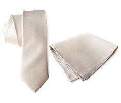 "Light tan/khaki silk & linen blend necktie. Pale ecru woven \"Davison\" tie. These come in one perfect \"Goldilocks\" middle tie size: our narrow, modern slim cut. Not too skinny, not too wide. Just right! In a woven shot pattern, the alternating silk and linen threads in the warp and weft of the fabric are each very light and a bit darker, when seen together make an extraordinarily unique solid fabric when seen at a distance. Neckties are $48 each; add a coordinating pocket square for just Beige Suit And Tie Accessories For Black Tie Event, Beige Standard Tie For Business, Cream Standard Tie For Wedding, Classic Beige Ties, Tie Box, Wood Tie, Silk Linen, Diamond Print, Light Tan