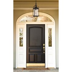 a black front door on a white house