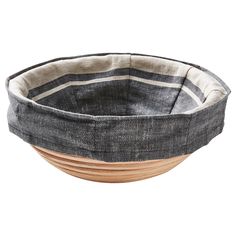 three wooden bowls stacked on top of each other in front of a white background with black and grey stripes