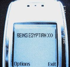 an electronic device with the words being egyptian and options exit written in black on it