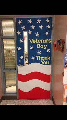 a door decorated with an american flag and the words veterans day thank you