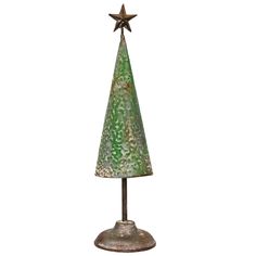 a metal christmas tree with a star on top