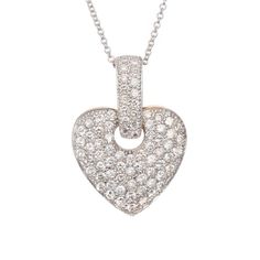 1.28 Carat pave diamond heart shaped pendant necklace. 14k yellow & white gold. Round brilliant cut Diamonds are Pavé set in a heart shaped pendant with an open circle for a large Diamond set bale. 16 inch white gold chain. 80 round Diamonds, approx. total weight 1.28cts, H – I, SI, 1.3 – 1.7mm 14k 2-tone gold 16 inch 14k white gold chain Tested and stamped: 14k 6.1 grams Top to bottom: 27.13mm or 1.07 inches Width: 19.58mm or .77 inch Depth: 3.78mm Opening: 4.8mm Antique Wedding Bands, Diamond Sapphire Engagement Ring, Antique Engagement Rings Vintage, White Gold Pendant Necklace, Heart Shaped Pendant Necklace, Heart Shaped Pendant, Vintage Sapphire, White Gold Pendant, Diamond Engagement Rings Vintage