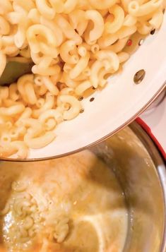 two bowls filled with macaroni and cheese on top of each other