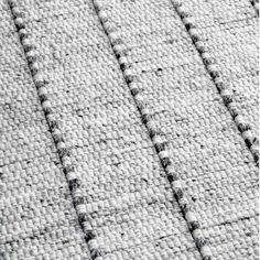 an up close shot of the texture of a rug