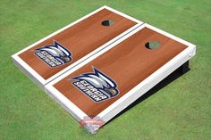 an image of a wooden and plastic cornhole game