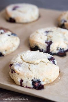 freshly baked blueberry scones on a baking sheet