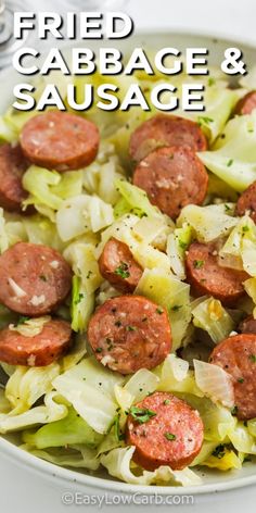 a bowl filled with cabbage and sausage