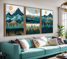 a living room with three paintings on the wall and a couch in front of it