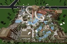 an aerial view of a tropical resort and pool