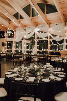 the tables are set with place settings for dinner