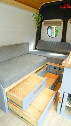 the inside of a camper with drawers and storage space for items to be stored