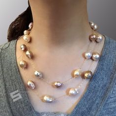 Very unique metallic multicolored freshwater baroque pearls, Pearls size measured from 9-13mm, every pearl holds beautiful golden or silvery tone, The metal is 14K gold filled, used heavy duty lobster claw clasp, very durable! You can wear it as single strand long necklace or double strand floating necklace as you wish too. It is a perfect gift for Anniversary, Birthday, Engagement, Wedding, Mother's day, Valentine's day or just a reward for yourself. Quality: AA++ Color: Natural metallic multic Gold Baroque Pearl Necklace In Briolette Shape, Gold Briolette Baroque Pearl Necklace, Yellow Gold Pearl Necklace With High Luster Baroque Pearls, Gold Briolette Pearl Necklace, Yellow Gold High Luster Baroque Pearl Necklace, Gold Baroque Pearl Necklace With High Luster, Baroque High Luster Gold Pearl Necklace, Gold Baroque Single Strand Necklace, Gold Akoya Pearl Necklace With High Luster