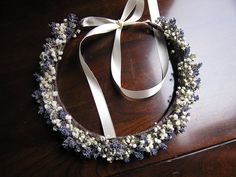 This gorgeous wedding hair crown was made with dried baby's breath and dried Lavender. Perfect for any weddings - inside or outside! The bridal hair crown is adjustable and bends very well because of the floral wire base. This dried flower crown ties in the back with a ribbon of your choice. I offer lavender, purple, white and ivory satin ribbon Very charming and has a wonderful fragrance because of the Lavender. Made to order! If you order only one, please give me one week to finish, if you wou Bridal Hair Crown, Hair Circlet, Boho Bridal Headpiece, Winter Bridal Bouquets, Boho Crown, Boho Headpiece, Wedding Hair Wreath, Bridal Bouquet Fall, Hair Crown