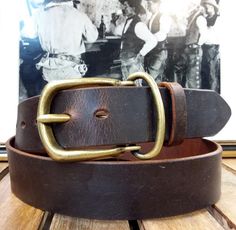 "This Merek Distressed Leather Belt comes with a unique vintage 1½\" antique brass or antique silver buckle with leather keeper. Available in a brown, tan, black, denim or stone vintage distressed leather bench crafted and handmade exclusively by New England Leathersmith Jeff Taylor from Cellar Leather on Cape Cod. Made in USA" Tooled Leather Belts, Handmade Leather Belt, Leather Bench, Luxury Belts, Tan Cowhide, Light Brown Leather, Veg Tan Leather