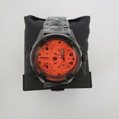 Men's Diesel Gunmetal Blood Red Moon Watch - Band New With Tags! - Limited Quanity -100% Authentic - Full Retail Package With All Accesories Case Size: 56mm Movement: Chronograph Platform: Boltdown Strap Material: Stainless Steel Water Resistance: 3 Atm Case Color: Gunmetal Case Material: 304 Stainless Steel Dial Color: Orange Strap Width: 26mm Closure: 2 Pusher Foldover Clasp Strap Inner Circumference: 200+/- 5mm Battery Type: Sr626sw Red Chronograph Watch With Metal Dial, Red Modern Chronograph Watch With Metal Dial, Modern Red Watches With Metal Dial, Designer Red Watch As A Gift, Orange Analog Watch With Round Dial, Blood Red Moon, Diesel Accessories, Moon Watch, Red Moon