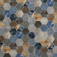 an image of a tile pattern that looks like hexagonals with different colors