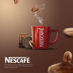 a red coffee cup with steam coming out of it and some nuts flying in the air