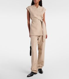 Bonnie cotton-blend vest in beige - Tove | Mytheresa Beige V-neck Vest For Work, Beige Workwear Vest, Cotton V-neck Vest For Daywear, Beige Vest For Work, Tailored Cotton Spring Vest, Tailored Cotton Vest For Spring, Fitted Cotton Vest For Workwear, Tailored Beige Tops For Work, Tailored Cotton Vest For Summer