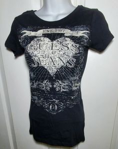 New Guess Jeans Jet Black T-shirt Extra Small XS Heart 1981 | eBay Trendy Black T-shirt With Heart Print, Grunge Cotton T-shirt With Heart Graphic, Black Trendy T-shirt With Heart Print, Grunge Crew Neck Top With Heart Graphic, Grunge Short Sleeve Top With Heart Graphic, Fitted Heart Print T-shirt With Crew Neck, Casual Fitted T-shirt With Heart Graphic, Black Tops With Heart Graphic And Short Sleeves, Black Short Sleeve Top With Heart Graphic