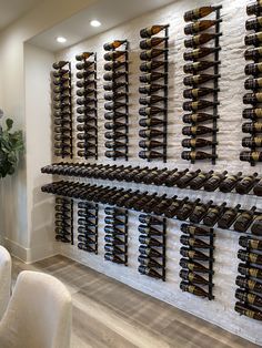 a room filled with lots of wine bottles