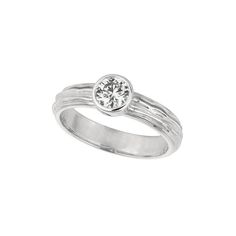 a white gold ring with a diamond in the center