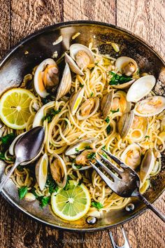 pasta with clams and lemons in a skillet