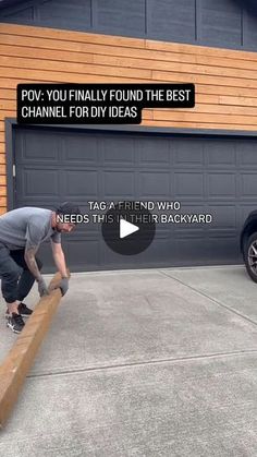 a man riding a skateboard down the side of a wooden ramp in front of a garage