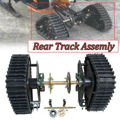 an image of the rear track assembly on a snowmobile with parts attached to it