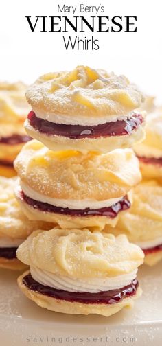 some very tasty looking desserts stacked on top of each other with the words mary berry's vietnamese whirls