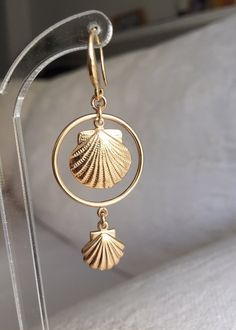 "SALE 40% - Original price was 84$ Now is 53$ for option #1. For option #2 original price was 51$ Now is 31$ These beautiful cool Gold filled Shell and circle earrings are made from Gold filled and Shells are 2018 most Trendy items. They make a thoughtful sister gift or friendship gift for a special person, just to remind them that you are thinking of them each time they look in the mirror or in their jewelry box ❤️ Or just buy them as a gift for yourself. For every day use, great for vacation s Shell Hoop Earrings, Gold Feather Earrings, Long Gold Earrings, Gold Coin Necklace, Seashell Jewelry, Gold Feathers, Coin Earrings, Hoop Earrings Gold, Shell Earrings