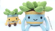 two small crocheted plants sitting next to each other