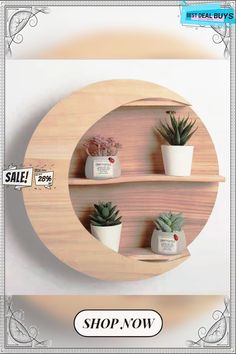 three wooden shelves with plants on them in front of a white wall and the words shop now