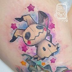 this is an image of a pokemon tattoo