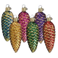 christmas ornaments are lined up in different colors