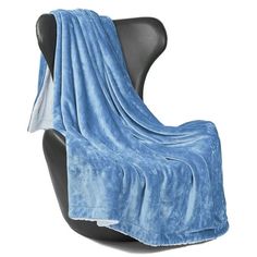 a chair with a blue blanket on it