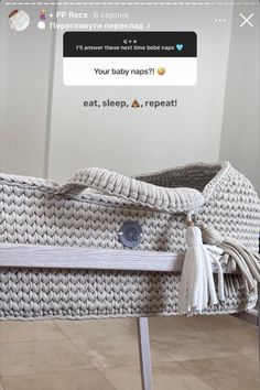 a white wicker purse sitting on top of a wooden table