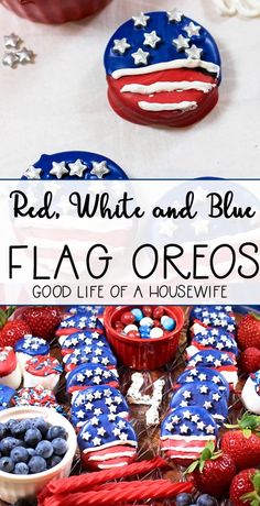 red, white and blue flag oreo cookies on a table with strawberries and berries