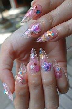 If you’re looking for a nail design that’s both enchanting and trendy, look no further than star nail designs. These mesmerizing looks capture the whimsy and wonder of the night sky, allowing you to carry Glitter Nails With Stars, Nails With Stars, Star Nail Designs, Junk Nails, Statement Nail, Star Nail, Celestial Magic, Star Nail Art