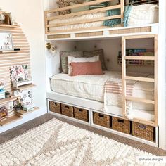 a bedroom with bunk beds and other items on the floor in front of a mirror